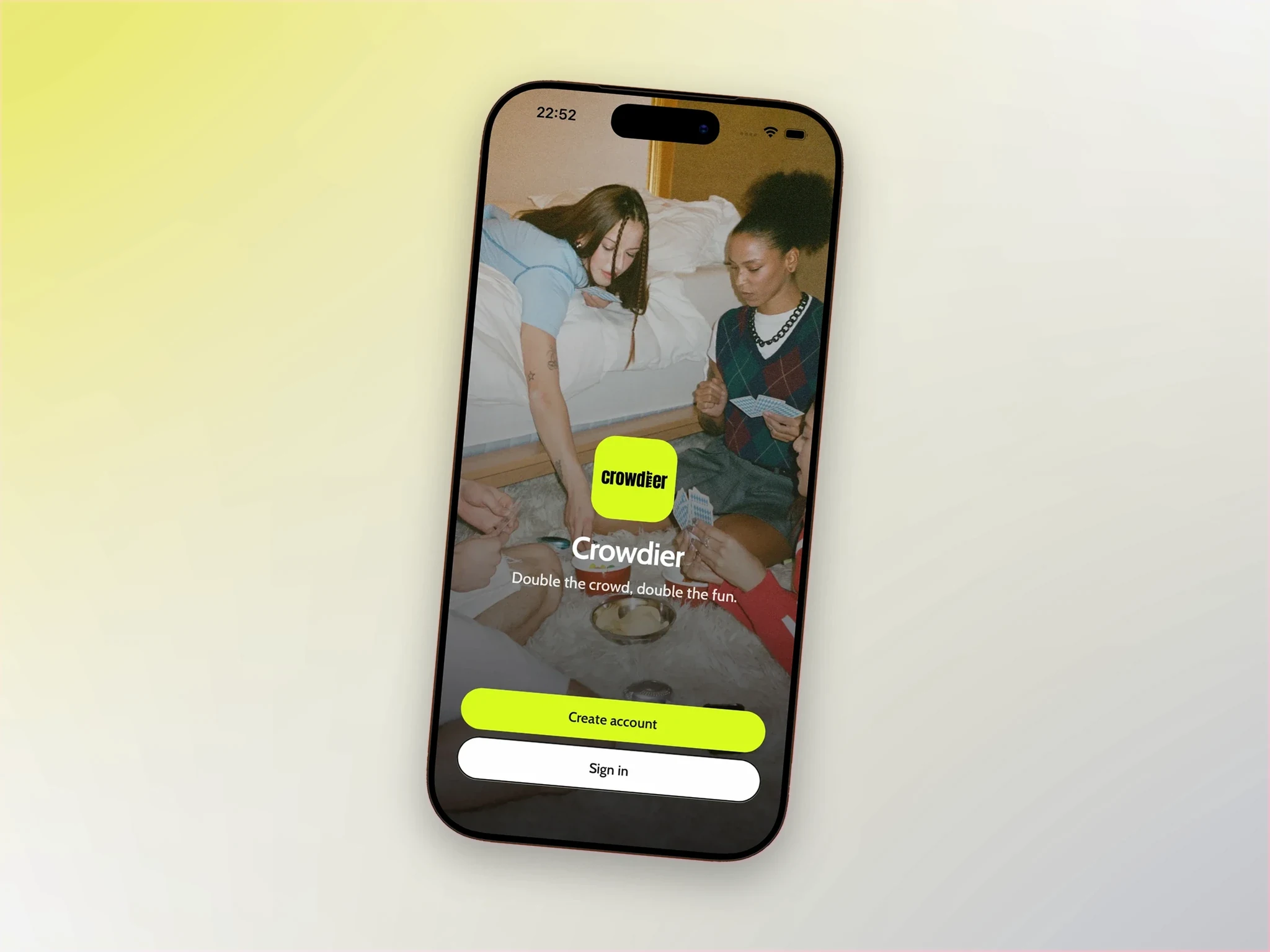 Crowdier welcome screen on a phone, over a photo of friends playing cards: Double the crowd, double the fun, with Create account and Sign in buttons